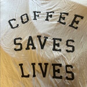 T-Shirt with Black print Coffee Saves Lives